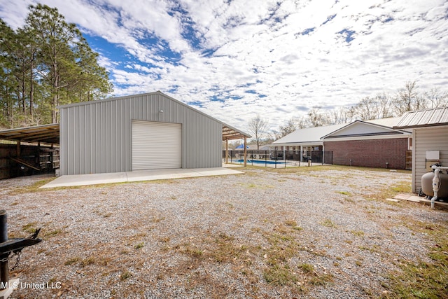 garage with a swimming pool