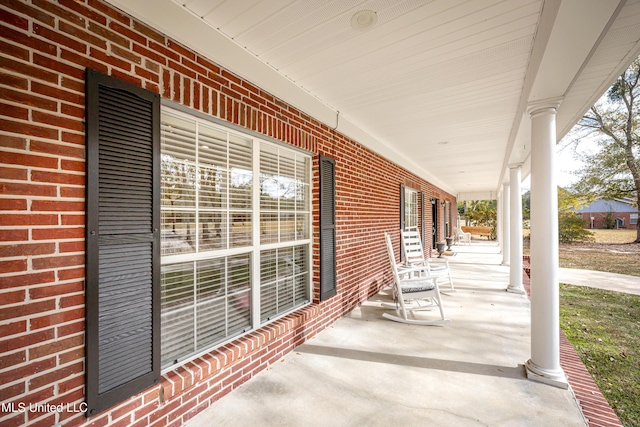 view of patio featuring a porch