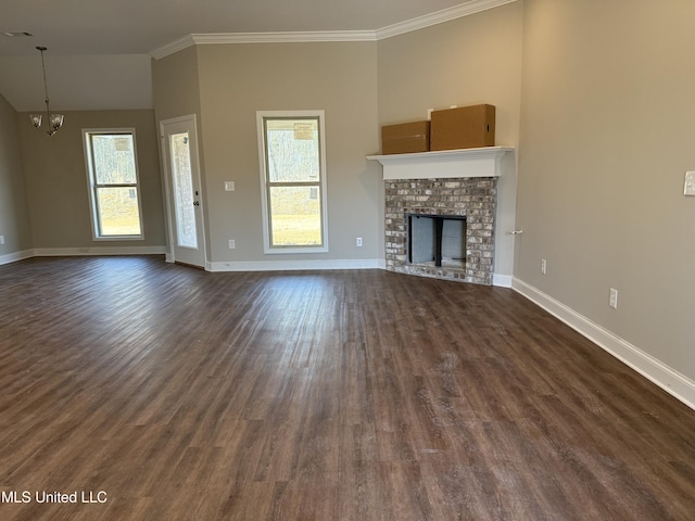 unfurnished living room featuring a healthy amount of sunlight, dark wood-style floors, a fireplace, and baseboards