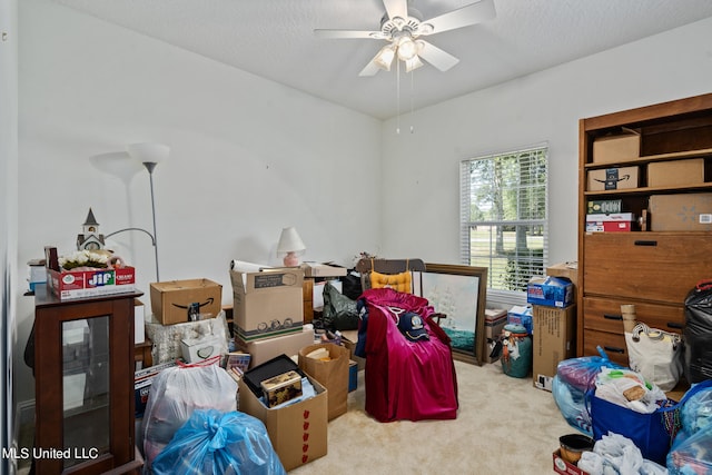 interior space featuring ceiling fan