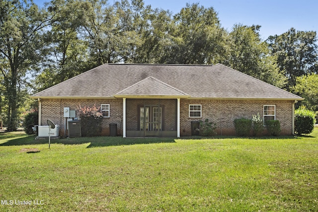 single story home featuring a front yard