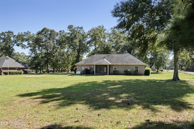 view of front of house with a front lawn