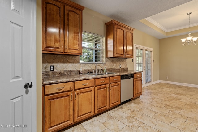 kitchen with sink, tasteful backsplash, dishwasher, and a wealth of natural light