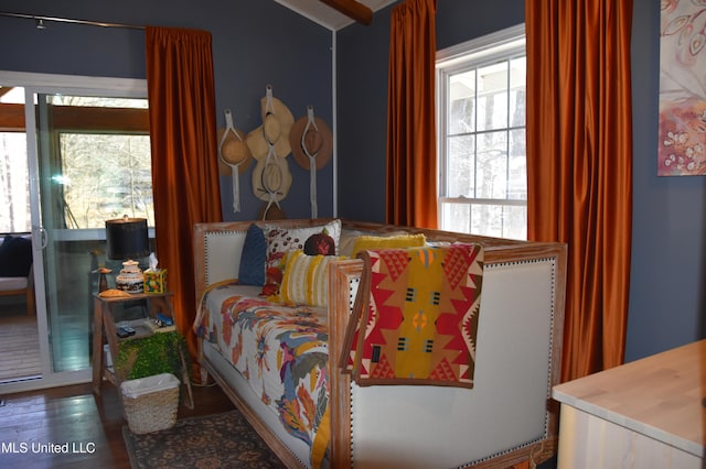 bedroom with wood finished floors