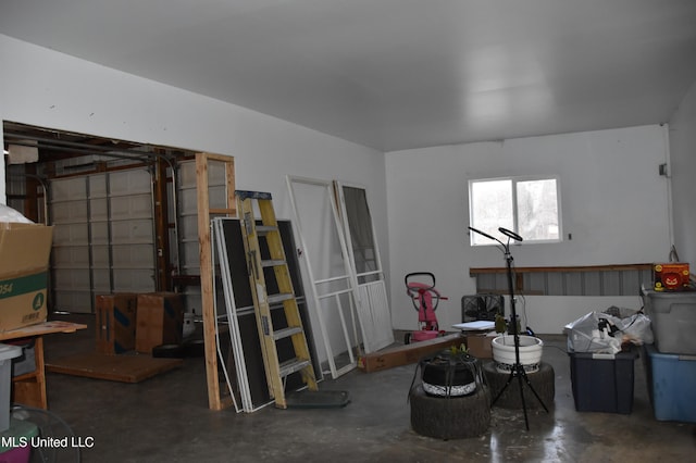 misc room with concrete floors