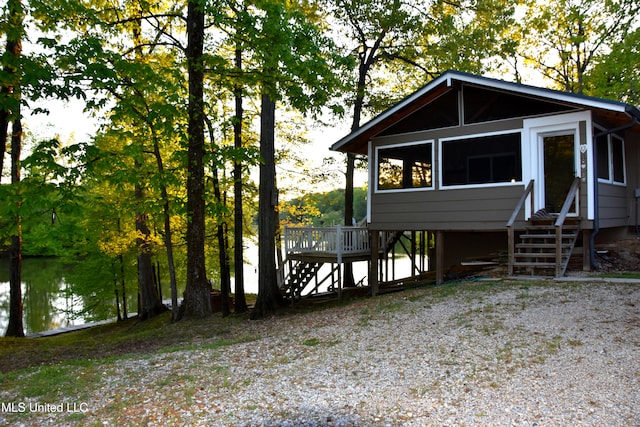 view of front of home with stairs