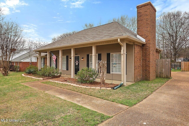 bungalow-style house with covered porch and a front yard