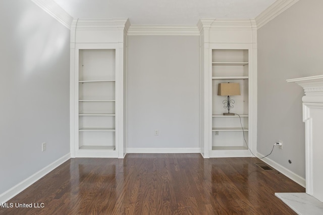 unfurnished bedroom with crown molding and dark wood-type flooring