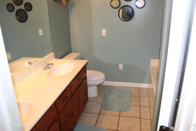 100 Roseleigh Cv, Batesville, MS 38606 - bathroom with double vanity, tile patterned floors, and a bathtub