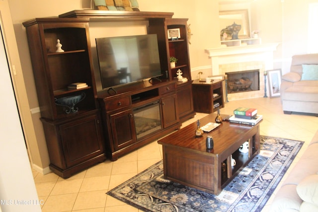 100 Roseleigh Cv, Batesville, MS 38606 - living room with light tile patterned floors and a fireplace
