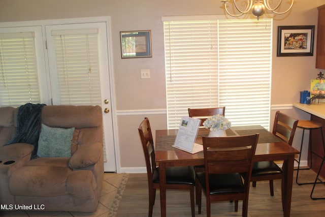 100 Roseleigh Cv, Batesville, MS 38606 - dining area featuring a chandelier and baseboards