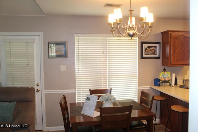 100 Roseleigh Cv, Batesville, MS 38606 - dining space featuring a chandelier
