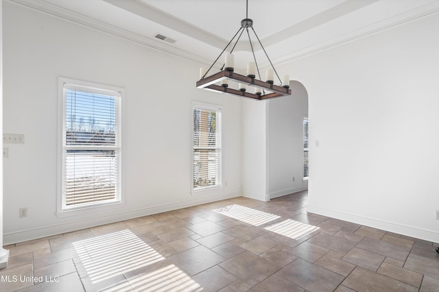 unfurnished dining area with a tray ceiling