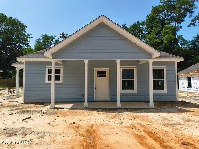 3121 Seahorse Rd, Gautier, MS 39553 - bungalow-style house with covered porch