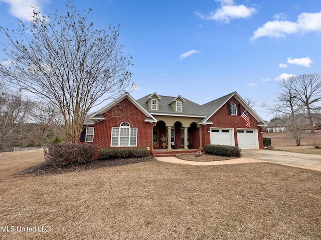 traditional-style home with brick siding, a porch, concrete driveway, and a garage