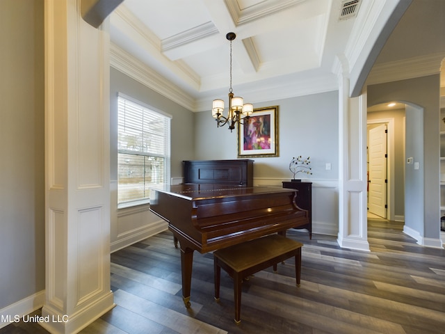 miscellaneous room featuring dark hardwood / wood-style floors, an inviting chandelier, coffered ceiling, and crown molding