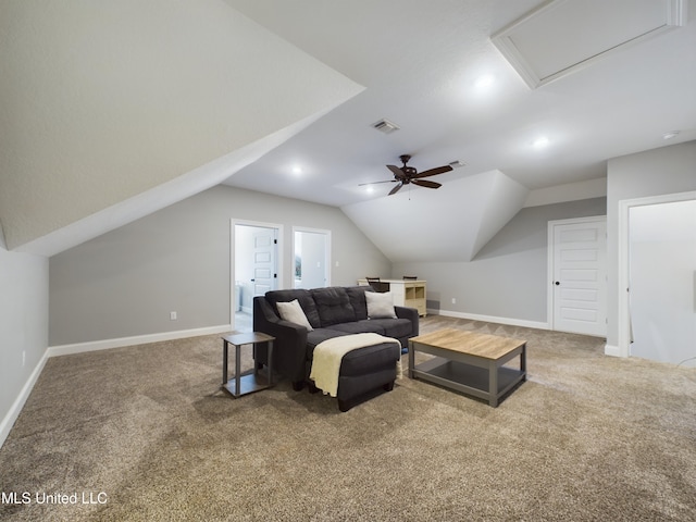 living room featuring carpet flooring, ceiling fan, and lofted ceiling