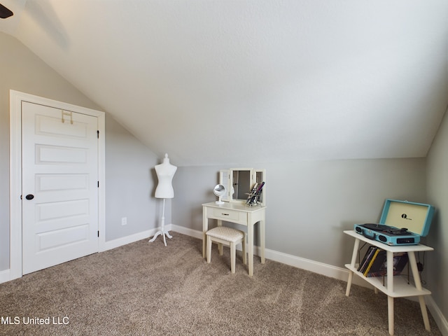 office space with carpet and lofted ceiling