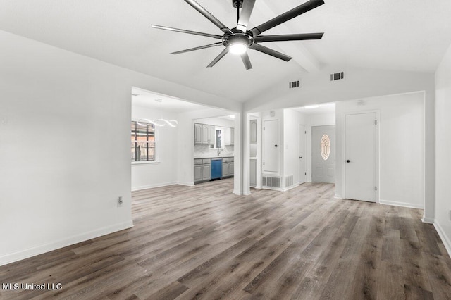 unfurnished living room featuring lofted ceiling with beams, dark hardwood / wood-style floors, and ceiling fan