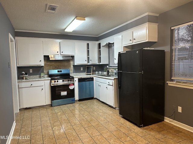 kitchen featuring stainless steel appliances, sink, white cabinets, and a textured ceiling