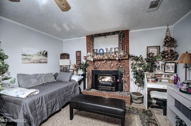 carpeted living room with a brick fireplace, ornamental molding, and a textured ceiling