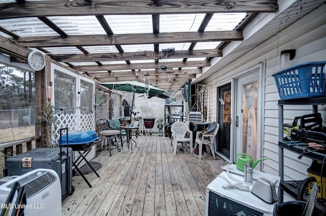 wooden deck featuring a pergola