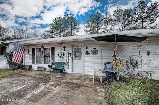 view of front of home with a patio