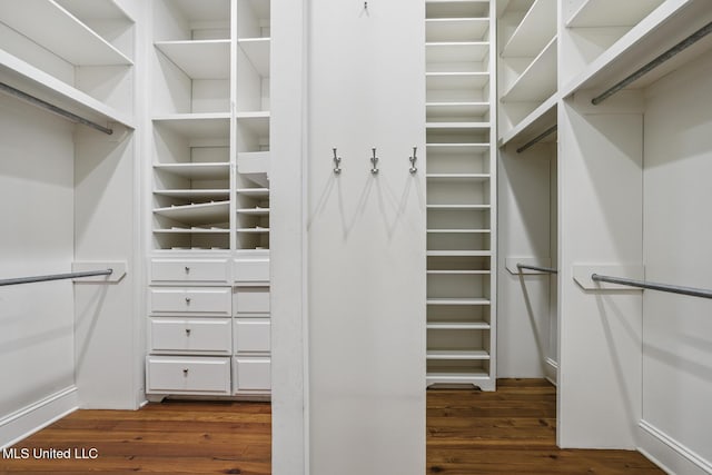 1 Cypress Ln, Jackson, MS 39211 - walk in closet with dark wood-style floors