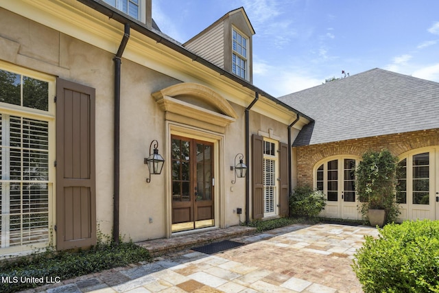 1 Cypress Ln, Jackson, MS 39211 - entrance to property featuring french doors and roof with shingles