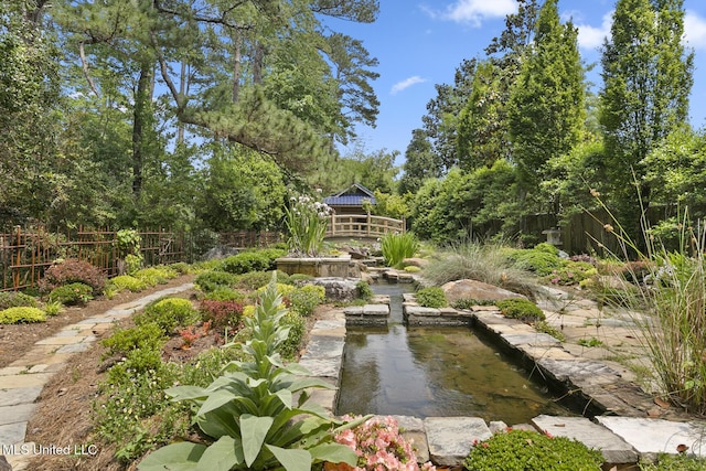 1 Cypress Ln, Jackson, MS 39211 - view of yard featuring a garden pond and a gazebo