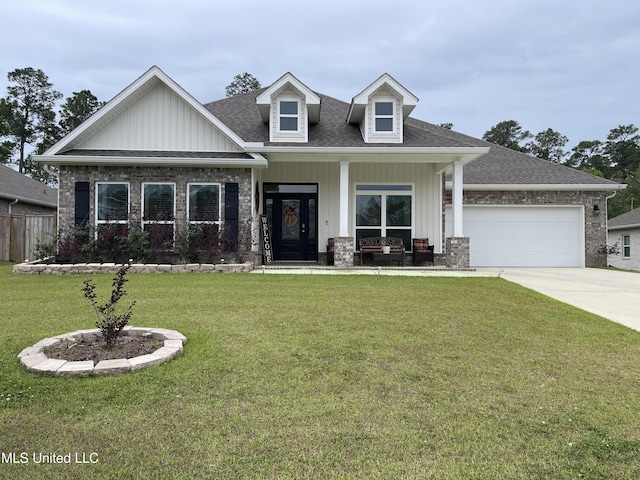 view of front of home featuring concrete driveway, an attached garage, a porch, a front yard, and roof with shingles