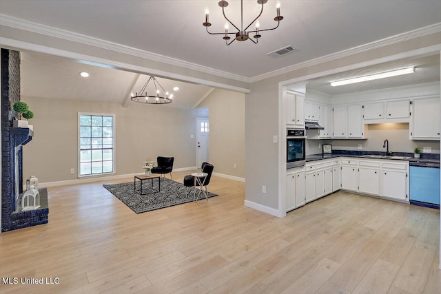 800 Longwood Pl, Clinton, MS 39056 - kitchen with a chandelier, dishwasher, oven, a sink, and dark countertops