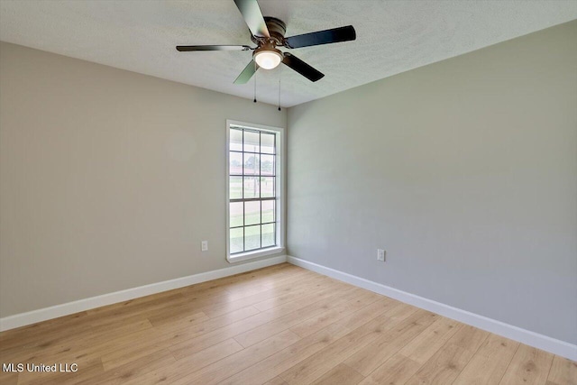 800 Longwood Pl, Clinton, MS 39056 - spare room featuring baseboards, light wood-style floors, ceiling fan, and a textured ceiling