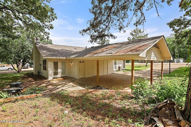 800 Longwood Pl, Clinton, MS 39056 - rear view of property with french doors, a carport, and a patio