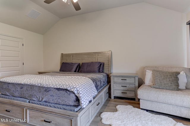2561 Dela Dr, Southaven, MS 38672 - bedroom featuring vaulted ceiling, wood finished floors, and ceiling fan