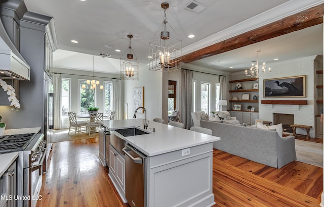 105 Longleaf Ln, Madison, MS 39110 - kitchen featuring a chandelier, appliances with stainless steel finishes, light wood finished floors, light countertops, and recessed lighting