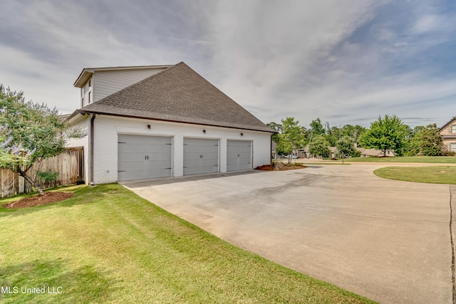 105 Longleaf Ln, Madison, MS 39110 - view of side of home with a shingled roof and concrete driveway