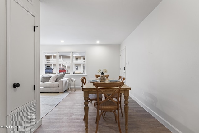 dining area with recessed lighting, visible vents, baseboards, and wood finished floors