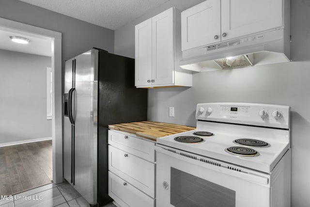 kitchen featuring a textured ceiling, stainless steel refrigerator with ice dispenser, wooden counters, white cabinetry, and white range with electric cooktop