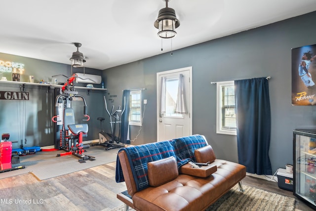 interior space featuring ceiling fan and hardwood / wood-style flooring