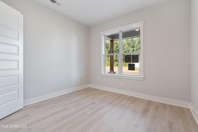 empty room featuring light hardwood / wood-style floors