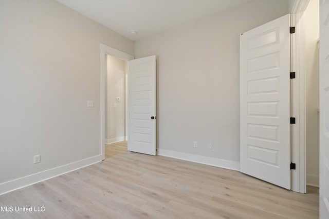 unfurnished bedroom featuring light hardwood / wood-style floors