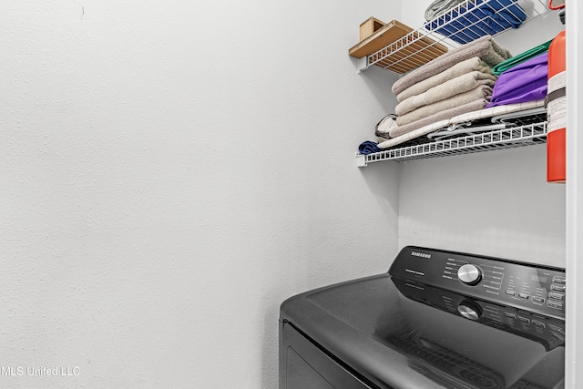 laundry room with washer / clothes dryer