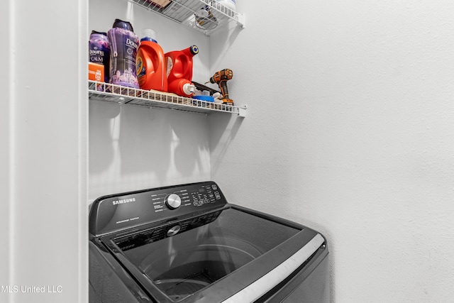 laundry area with washer / dryer