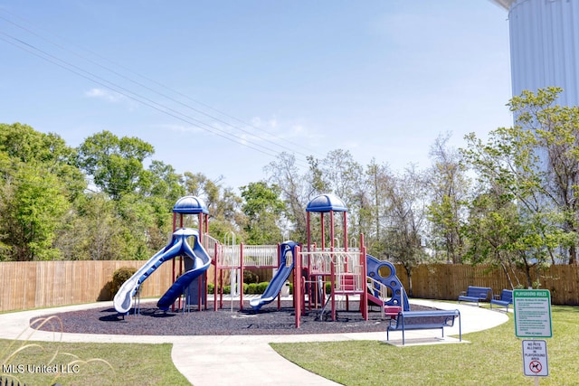 view of play area featuring a lawn