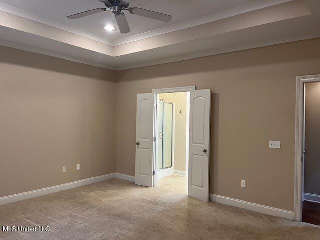 carpeted spare room with recessed lighting, baseboards, a raised ceiling, and ceiling fan