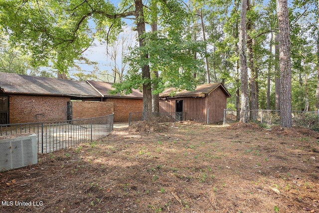 view of yard with central AC