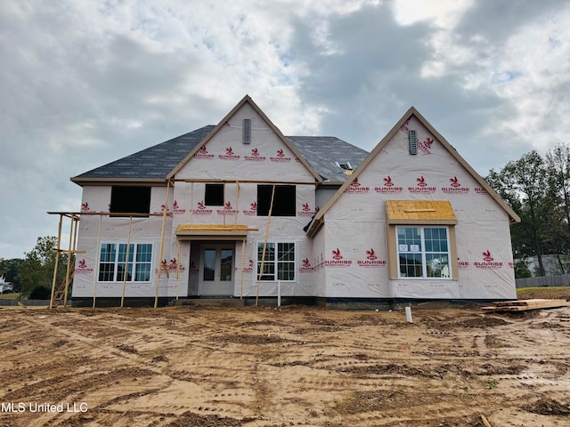 property under construction with french doors