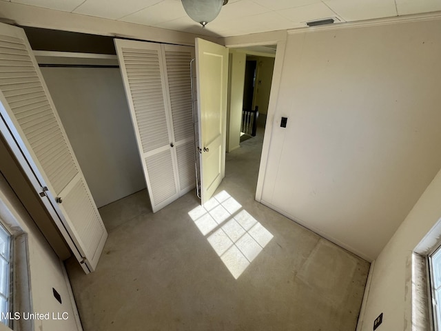 unfurnished bedroom with a closet