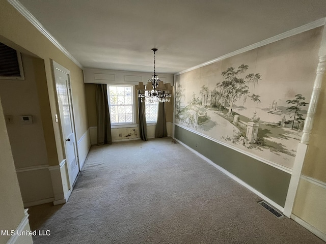 unfurnished dining area with ornamental molding, light colored carpet, and an inviting chandelier